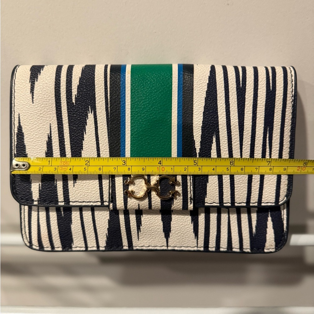C. Wonder Black and White Clutch with Green Accent